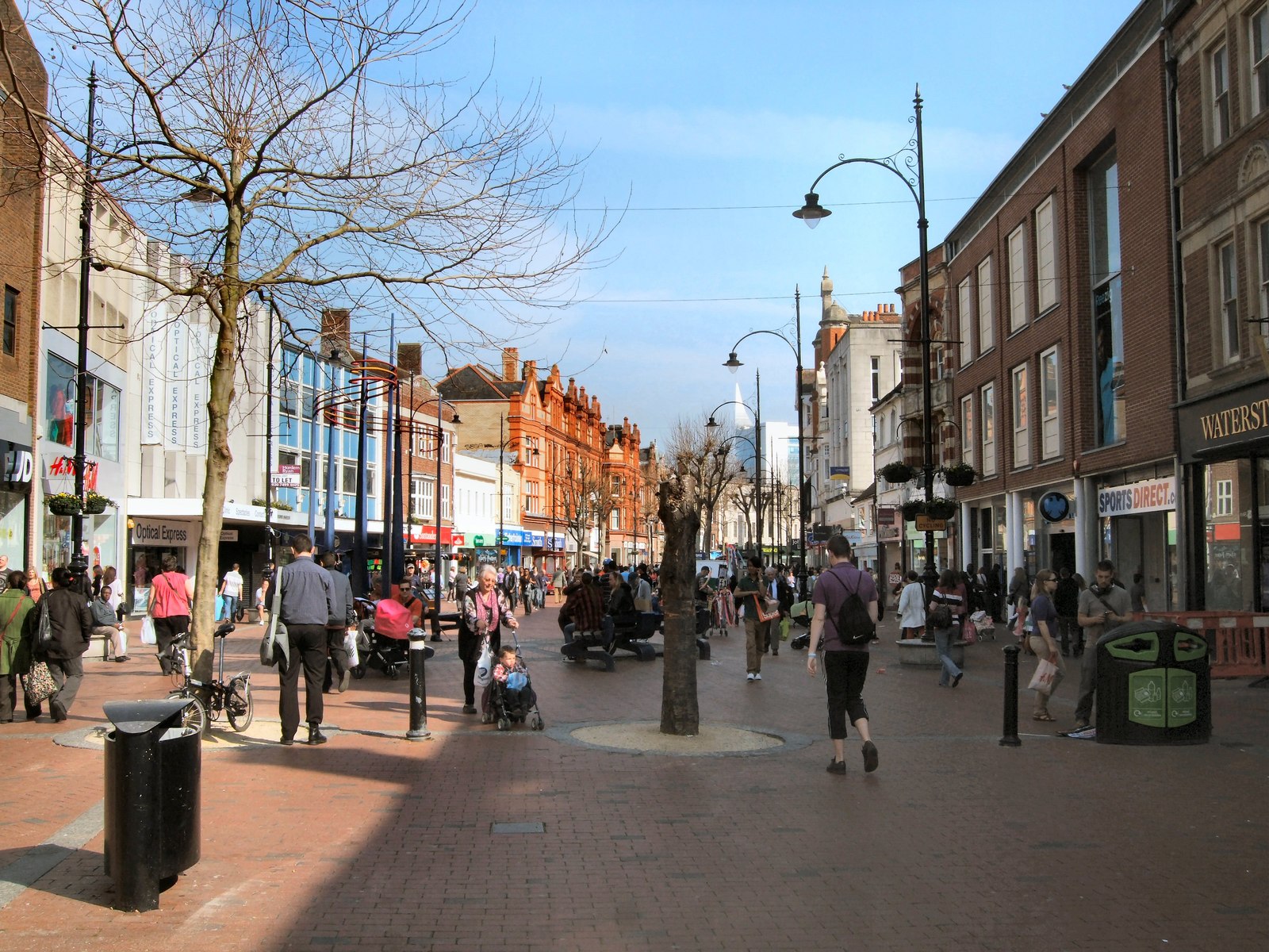 Meme Analysis | Rapidly Viral A busy street scene shows pedestrians and shops, illustrating how memes reflect everyday life and internet culture.