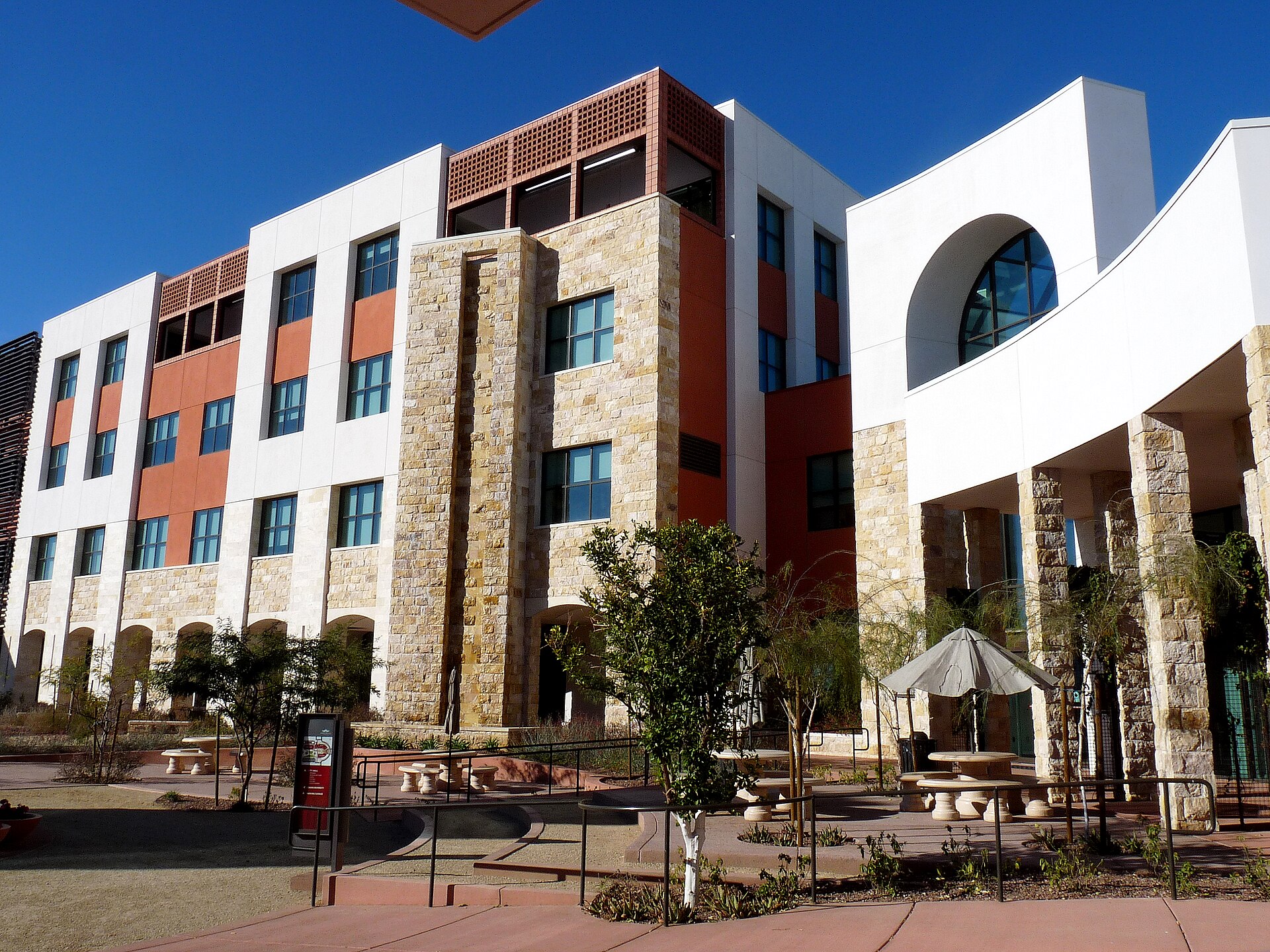 University Building | Rapidly Viral A university building with a courtyard is shown, illustrating how shareable content can unexpectedly gain traction.